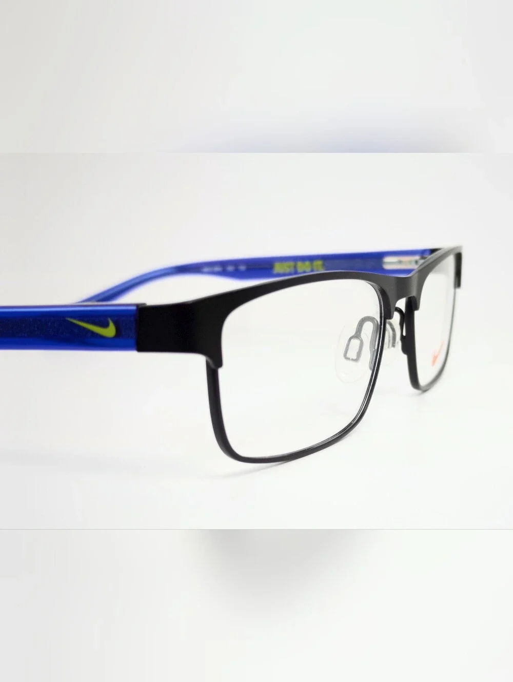 Nike Youth. Black metal front, Royal Blue Temples With Lime Green Swoosh.